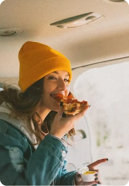 Customer eating pizza